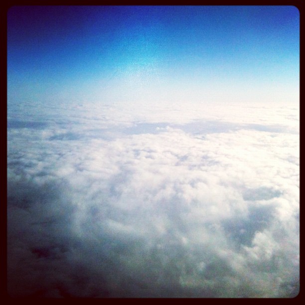 above the rain clouds